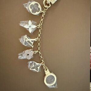 Brand new Upcycled Gold/ nude LV bag charm